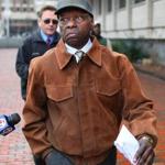 Onyango Obama in January 2013, leaving the JFK federal building after his arraignment on immigration charges. 